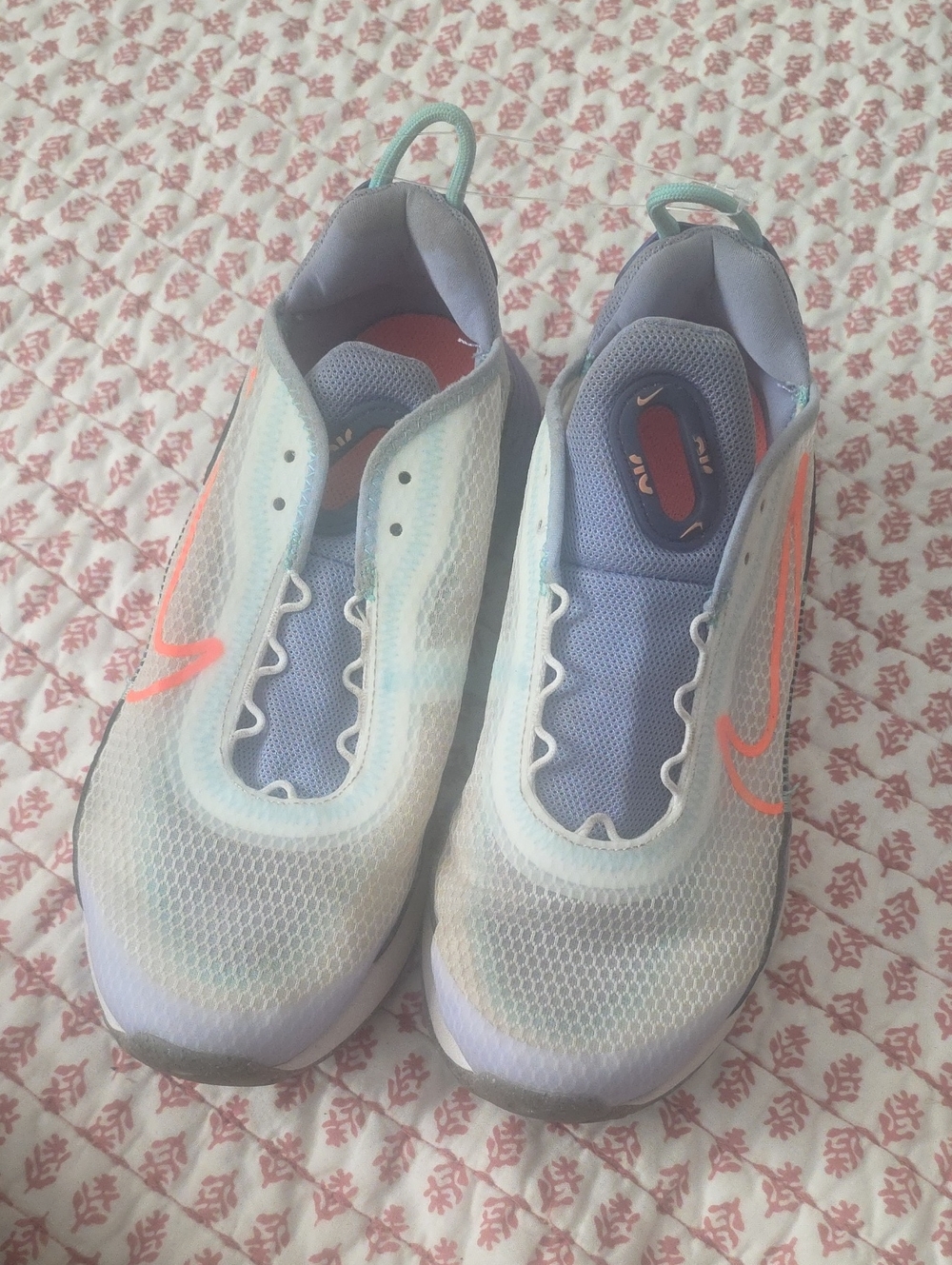 Nike Women’s Light Blue Slip-On Running Shoes with Coral Swoosh( No Strings)